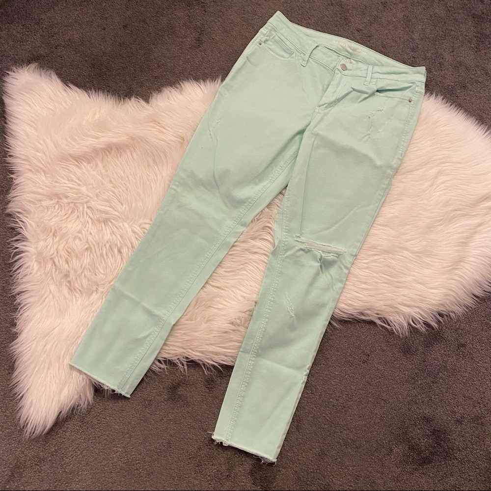 Mint distressed skinny jeans
